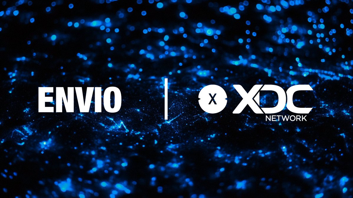 Envio and XDC Network partnership banner with both logos over a blue particle background
